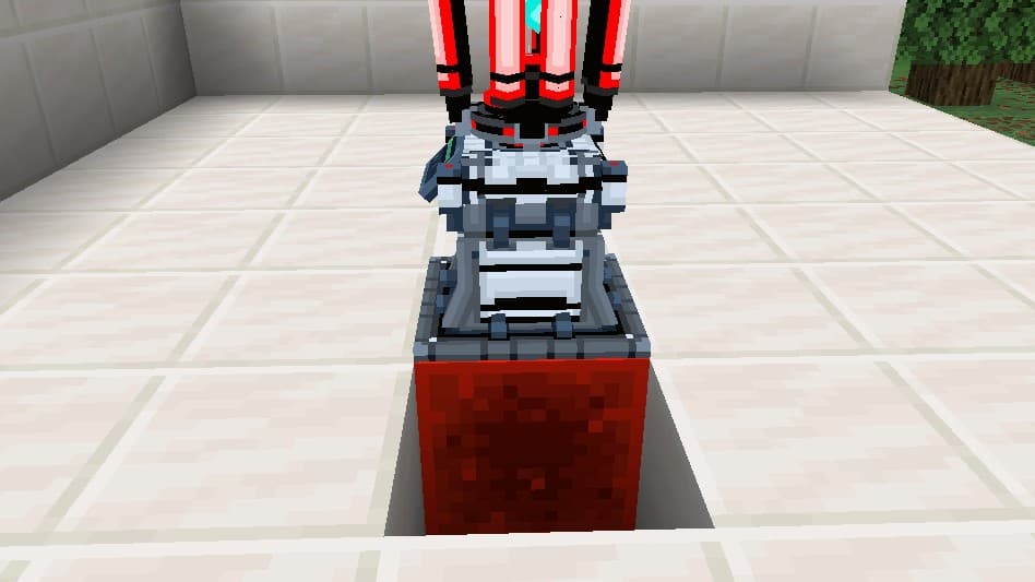 Powered by a Redstone Block placed directly under the machine.